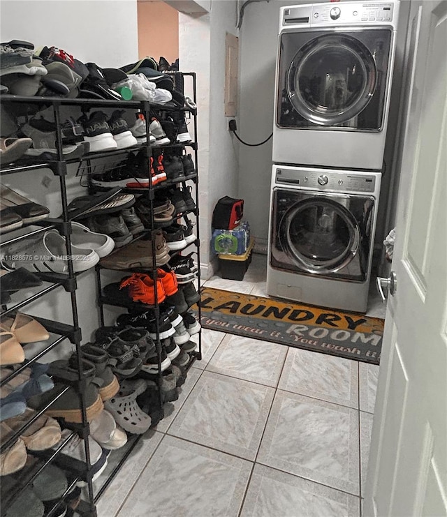 7060 W 2nd Way Unit 7060, Hialeah, FL 33014 - laundry area featuring stacked washer / dryer and tile patterned flooring