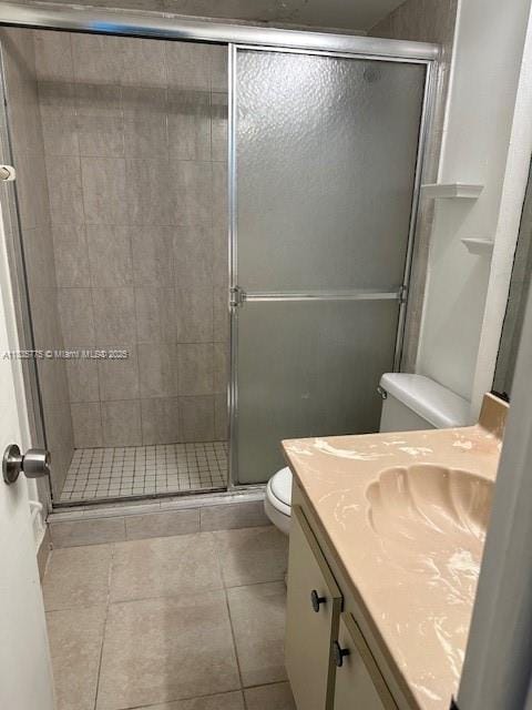 17890 W Dixie Hwy Unit 219, Miami, FL 33160 - full bathroom featuring vanity, tile patterned flooring, and a shower stall