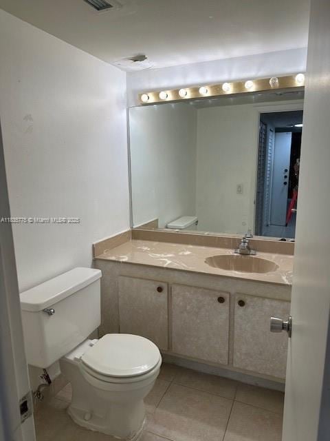 17890 W Dixie Hwy Unit 219, Miami, FL 33160 - bathroom with vanity and tile patterned flooring