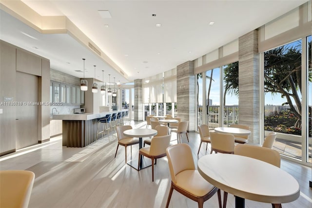 4100 Island Blvd Unit 701, Aventura, FL 33160 - dining space with light wood-type flooring