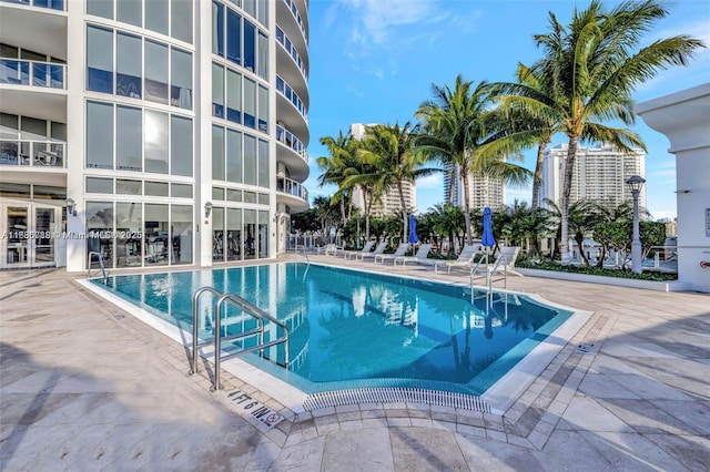 4100 Island Blvd Unit 701, Aventura, FL 33160 - community pool with a patio area