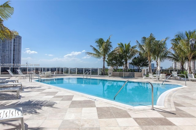 4100 Island Blvd Unit 701, Aventura, FL 33160 - community pool with a patio area