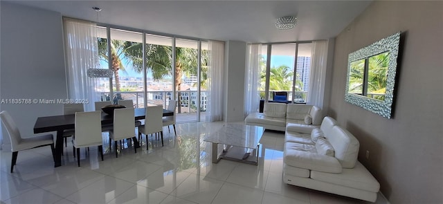 4100 Island Blvd Unit 701, Aventura, FL 33160 - living room featuring a wall of windows and tile patterned flooring