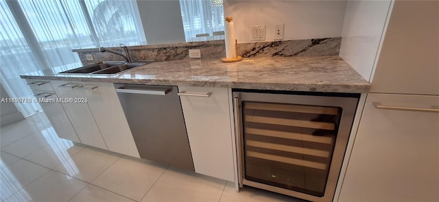 4100 Island Blvd Unit 701, Aventura, FL 33160 - kitchen with wine cooler, white cabinets, and dishwasher