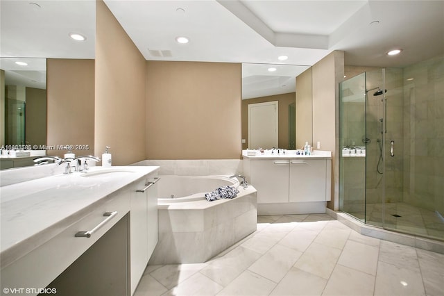 4100 Island Blvd Unit 701, Aventura, FL 33160 - bathroom with a shower stall, a tub with jets, two vanities, and recessed lighting