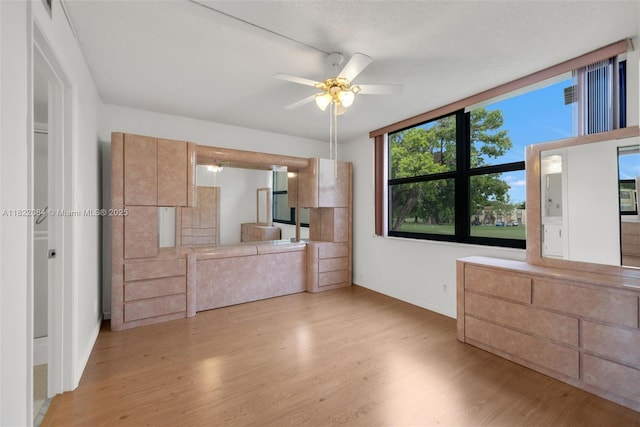 7331 NW 18th St Unit 205, Margate, FL 33063 - unfurnished living room with ceiling fan and wood finished floors