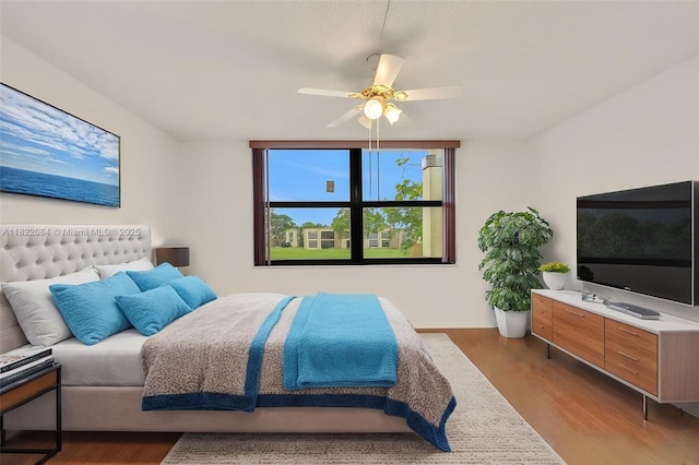 7331 NW 18th St Unit 205, Margate, FL 33063 - bedroom featuring wood finished floors and ceiling fan
