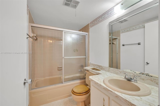 7331 NW 18th St Unit 205, Margate, FL 33063 - full bath with vanity, enclosed tub / shower combo, and tile patterned flooring