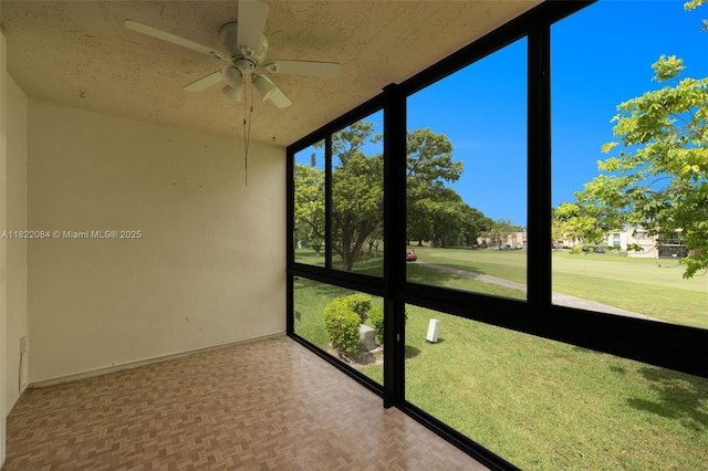 7331 NW 18th St Unit 205, Margate, FL 33063 - unfurnished sunroom featuring a ceiling fan
