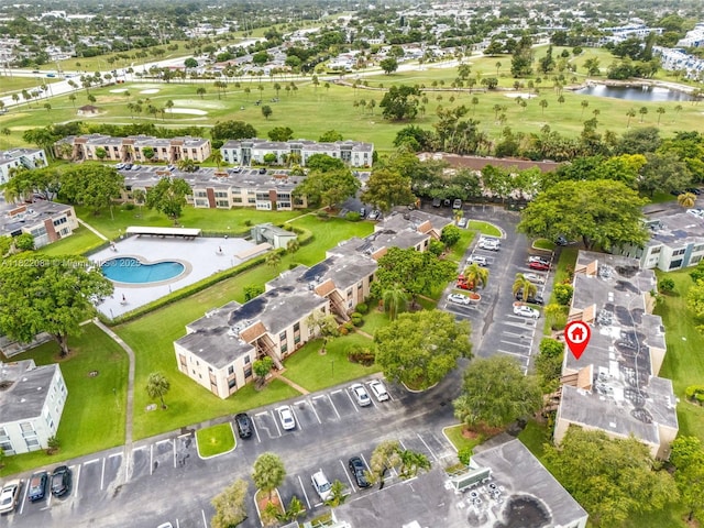 7331 NW 18th St Unit 205, Margate, FL 33063 - aerial view of property and surrounding area featuring a local golf course and a large body of water