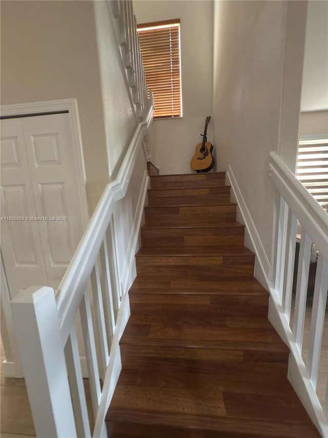 15260 SW 91st Ln, Miami, FL 33196 - stairway featuring wood finished floors