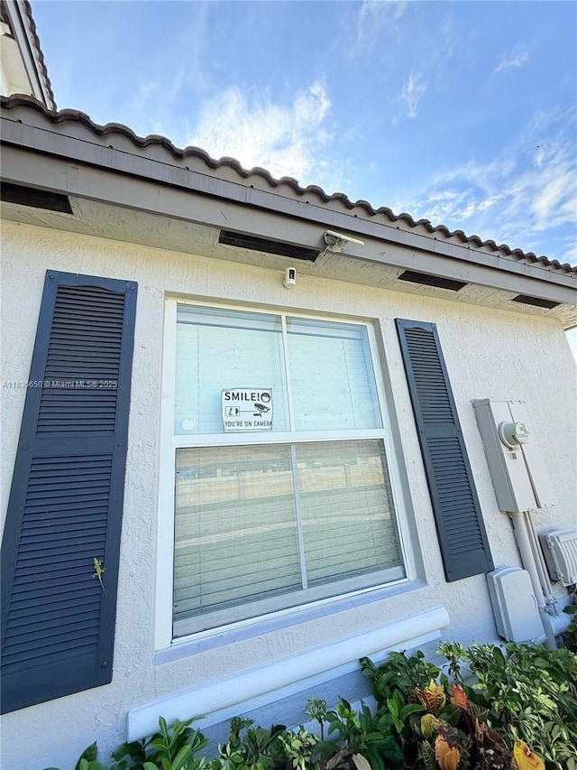 15260 SW 91st Ln, Miami, FL 33196 - exterior view of stucco siding and electric meter