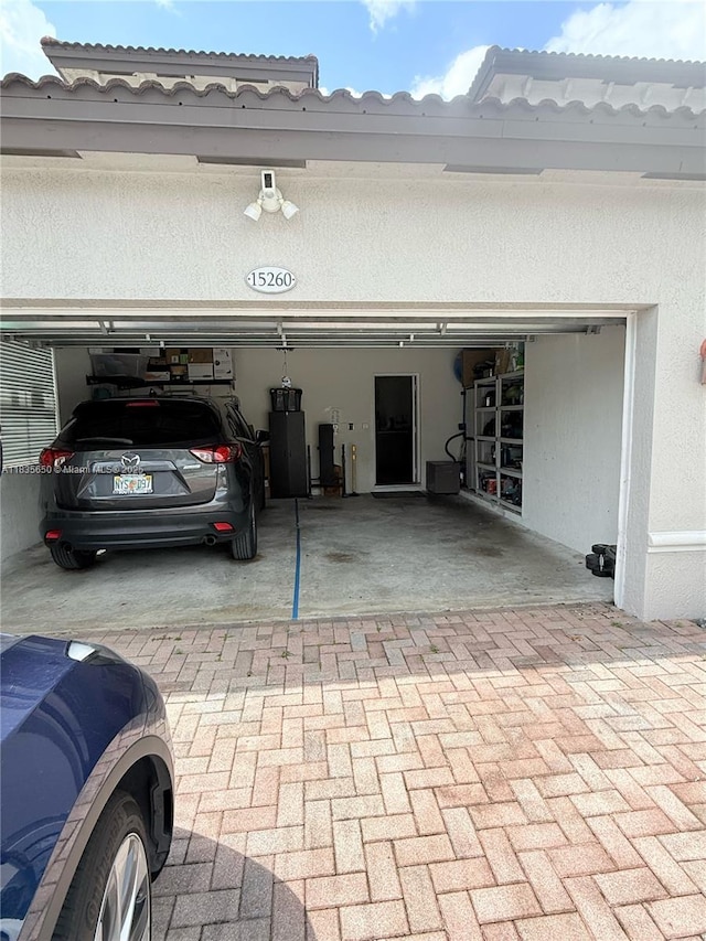 15260 SW 91st Ln, Miami, FL 33196 - garage with decorative driveway