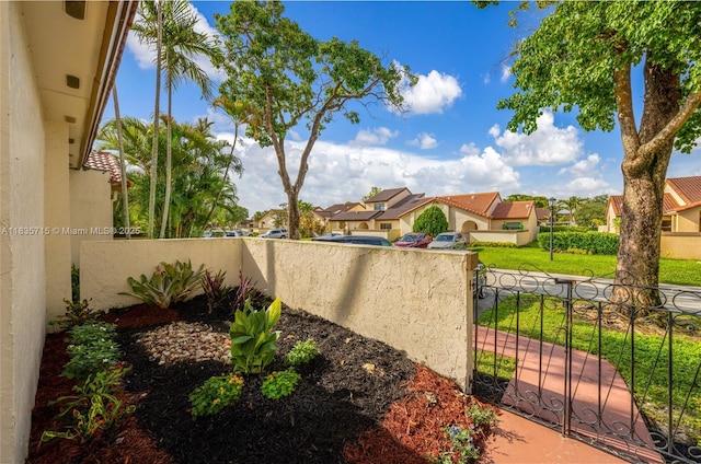 6637 NW 181st Ln, Hialeah, FL 33015 - view of yard with a residential view and a gate