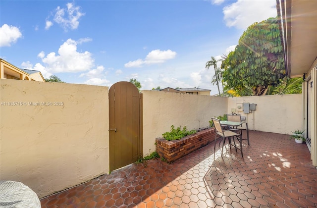 6637 NW 181st Ln, Hialeah, FL 33015 - view of patio with a gate