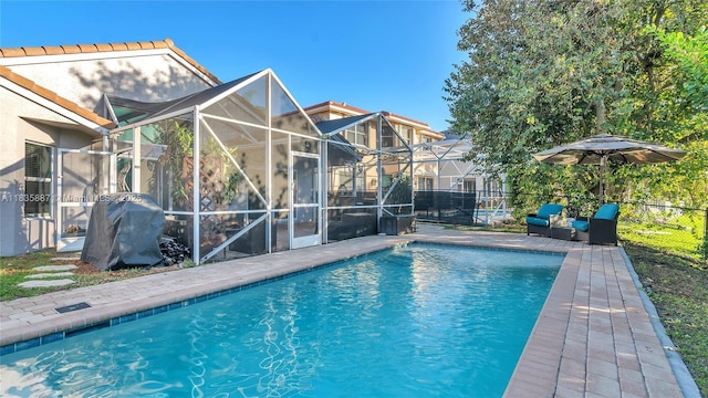 5382 NW 120th Ave, Coral Springs, FL 33076 - view of swimming pool featuring a lanai, a patio, and area for grilling
