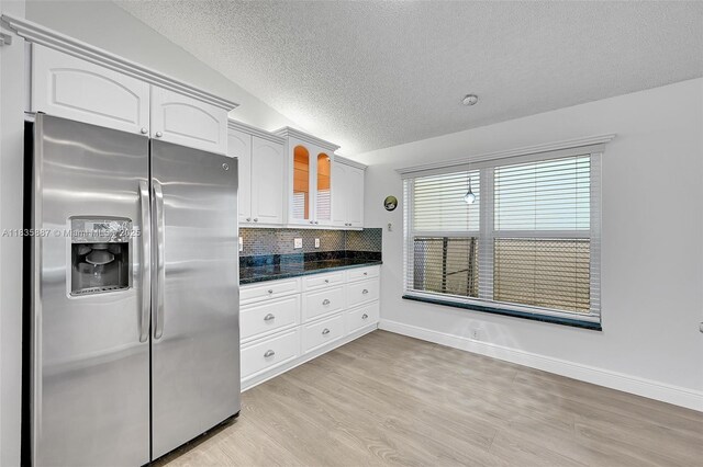 5382 NW 120th Ave, Coral Springs, FL 33076 - kitchen featuring stainless steel refrigerator with ice dispenser, light wood-style floors, a textured ceiling, backsplash, and white cabinets