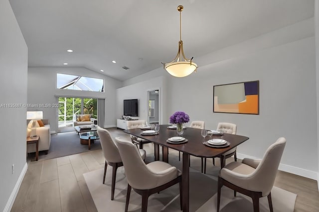 5382 NW 120th Ave, Coral Springs, FL 33076 - dining area featuring light wood-type flooring, lofted ceiling, and recessed lighting