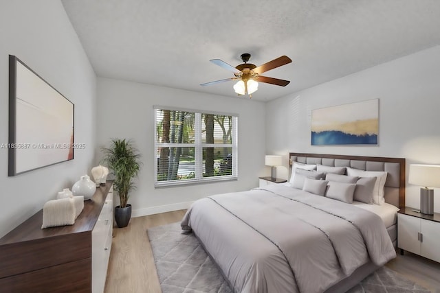 5382 NW 120th Ave, Coral Springs, FL 33076 - bedroom with wood finished floors and ceiling fan