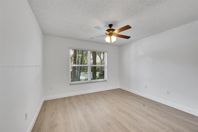 5382 NW 120th Ave, Coral Springs, FL 33076 - unfurnished room with light wood-type flooring, a textured ceiling, and ceiling fan