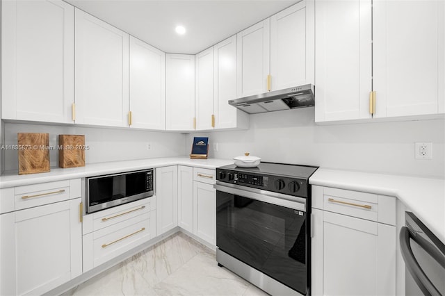 500 NW 7th Ct, Hallandale Beach, FL 33009 - kitchen featuring stainless steel appliances, under cabinet range hood, light marble finish flooring, light countertops, and recessed lighting