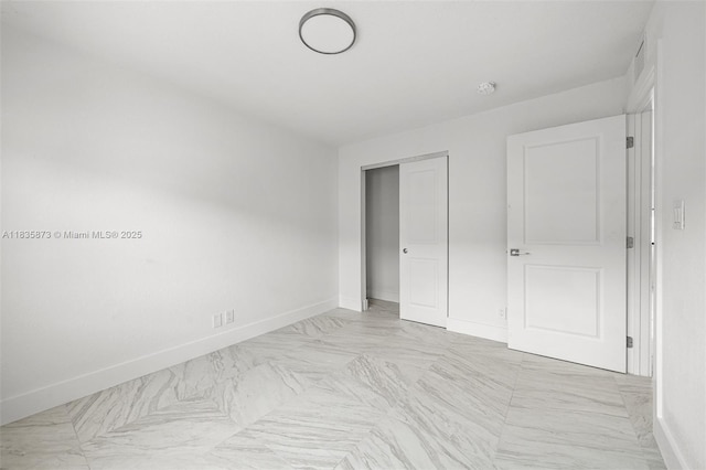 500 NW 7th Ct, Hallandale Beach, FL 33009 - unfurnished bedroom with baseboards and a closet