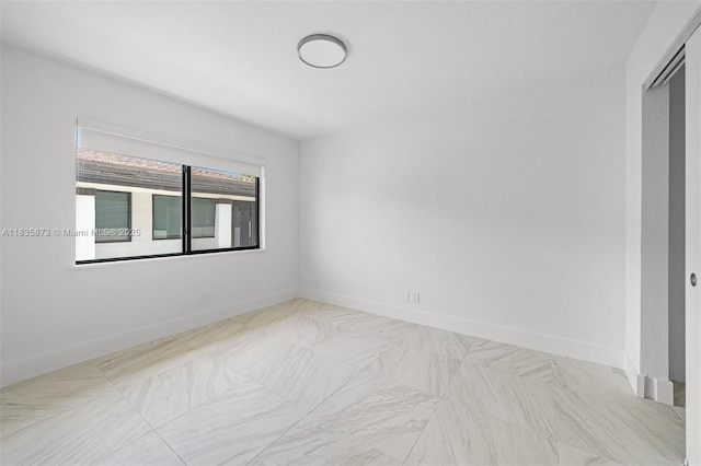 500 NW 7th Ct, Hallandale Beach, FL 33009 - spare room with baseboards