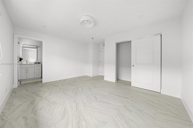 500 NW 7th Ct, Hallandale Beach, FL 33009 - unfurnished bedroom featuring a closet and ensuite bathroom
