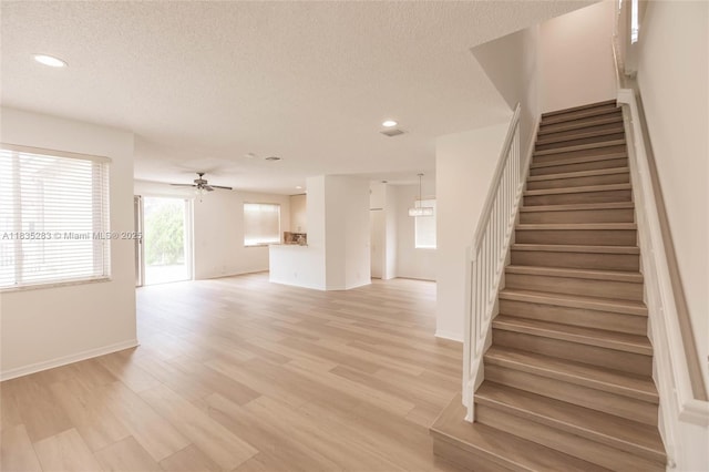 1326 Majesty Ter, Weston, FL 33327 - staircase with a textured ceiling, wood finished floors, recessed lighting, and a ceiling fan