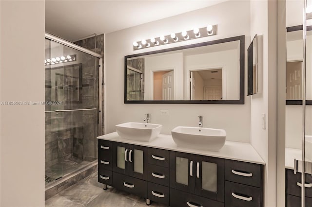 1326 Majesty Ter, Weston, FL 33327 - bathroom with double vanity, a stall shower, and marble look tile flooring