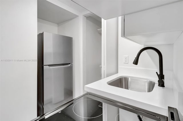 1260 SW 4th St, Miami, FL 33135 - kitchen with freestanding refrigerator and light countertops