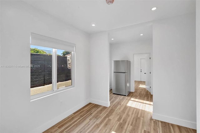 1260 SW 4th St, Miami, FL 33135 - unfurnished room with light wood-style floors and recessed lighting