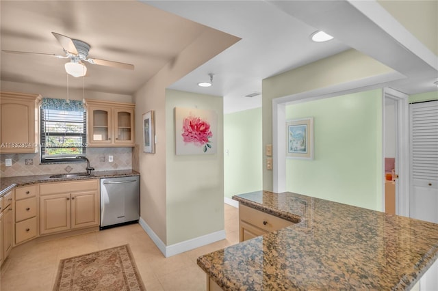 2430 Deer Creek Country Club Blvd Unit 304-2, Deerfield Beach, FL 33442 - kitchen featuring stainless steel dishwasher, decorative backsplash, ceiling fan, light tile patterned floors, and glass insert cabinets