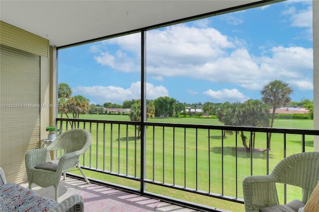 2430 Deer Creek Country Club Blvd Unit 304-2, Deerfield Beach, FL 33442 - sunroom / solarium with golf course view