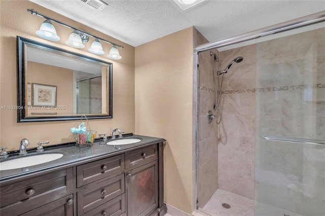 2430 Deer Creek Country Club Blvd Unit 304-2, Deerfield Beach, FL 33442 - bathroom with a stall shower, double vanity, and a textured ceiling