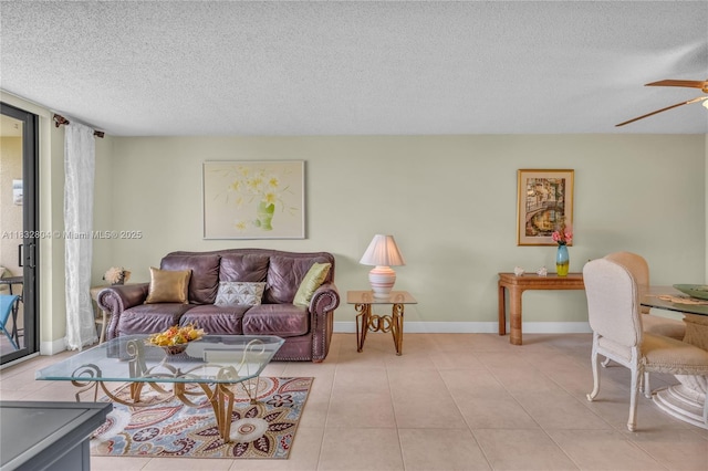 2430 Deer Creek Country Club Blvd Unit 304-2, Deerfield Beach, FL 33442 - living room with a textured ceiling, ceiling fan, and light tile patterned floors