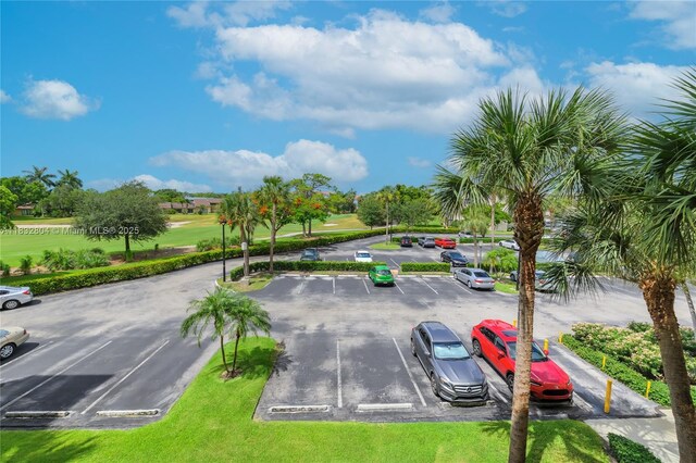 2430 Deer Creek Country Club Blvd Unit 304-2, Deerfield Beach, FL 33442 - view of uncovered parking lot