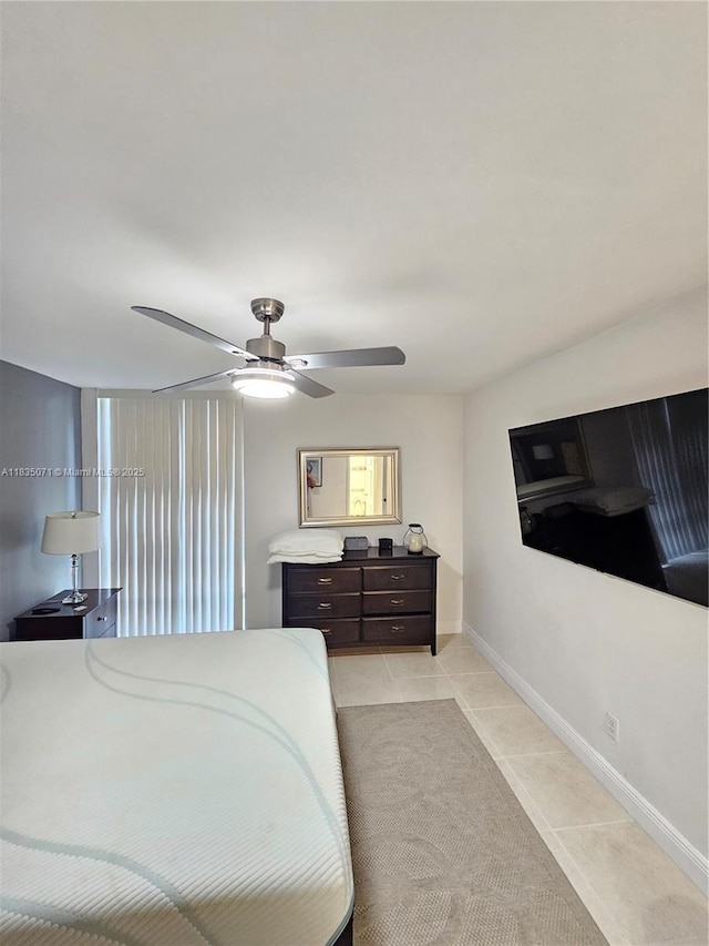 200 172nd St Unit 217, Sunny Isles Beach, FL 33160 - bedroom featuring light tile patterned flooring and a ceiling fan