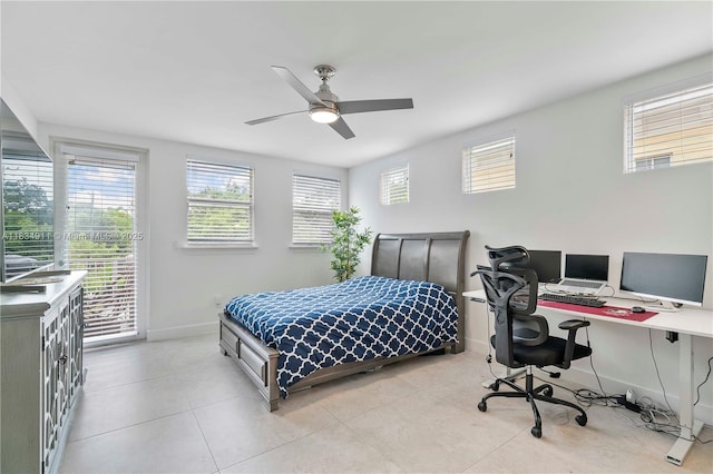 217 SW 11th St, Fort Lauderdale, FL 33315 - tiled bedroom with access to outside, an office area, and a ceiling fan