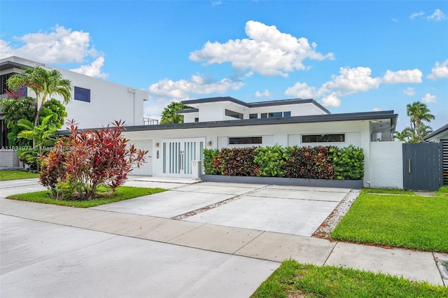 1930 NE 193rd St, Miami, FL 33179 - contemporary home featuring stucco siding