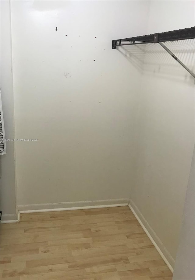 1101 Colony Point Cir Unit 206, Pembroke Pines, FL 33026 - walk in closet with light wood-style floors