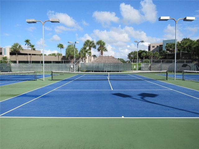 1101 Colony Point Cir Unit 206, Pembroke Pines, FL 33026 - view of tennis court featuring community basketball court