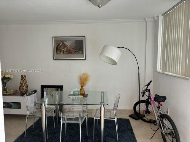 14150 SW 84th St Unit 201-I, Miami, FL 33183 - dining room featuring tile patterned floors and ornamental molding