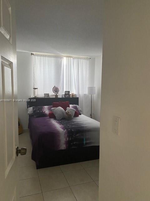 14150 SW 84th St Unit 201-I, Miami, FL 33183 - bedroom with tile patterned floors