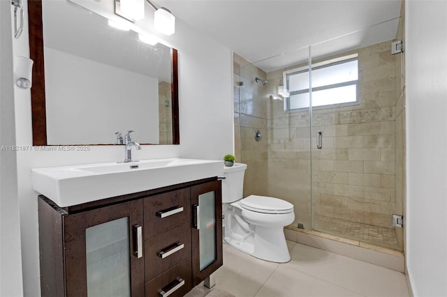 1660 NE 191st St Unit 206-1, Miami, FL 33179 - bathroom featuring vanity, a shower stall, and tile patterned floors