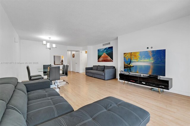 1660 NE 191st St Unit 206-1, Miami, FL 33179 - living room with wood finished floors and baseboards