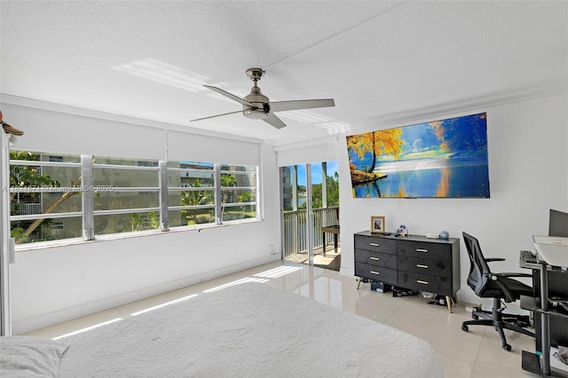1660 NE 191st St Unit 206-1, Miami, FL 33179 - tiled bedroom featuring an office area, access to exterior, and ceiling fan