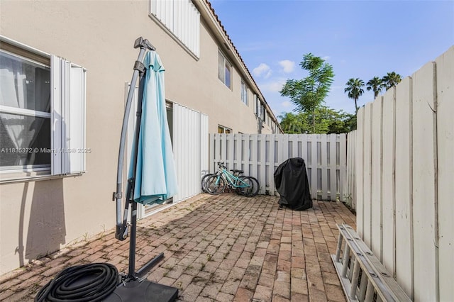 11532 SW 148th Path, Miami, FL 33196 - fenced backyard with a patio area and area for grilling