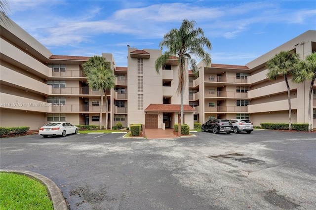 1911 Sabal Palm Dr Unit 304, Davie, FL 33324 - view of apartment building / complex with uncovered parking