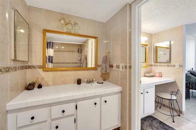 1911 Sabal Palm Dr Unit 304, Davie, FL 33324 - full bath featuring tile walls, vanity, tile patterned floors, tasteful backsplash, and a shower with shower curtain